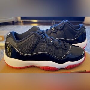 Air Jordan 11 Retro Low Bred Grade School Lifestyle Shoes (Black/Red/White)